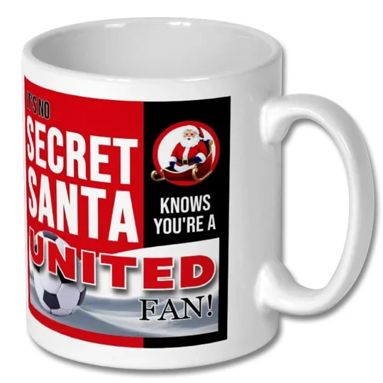 Manchester United-inspired festive football gift mug showing the full-colour design on a glossy white ceramic mug