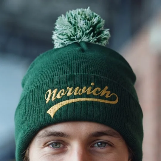 Norwich-inspired football bobble hat with embroidered detailing