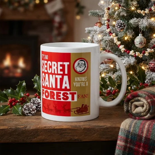 Nottingham Forest-inspired Secret Santa Christmas mug with full-colour football-themed artwork on a white mug