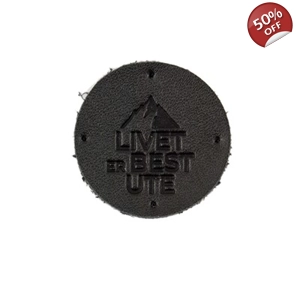 Skinn merke med tekst 