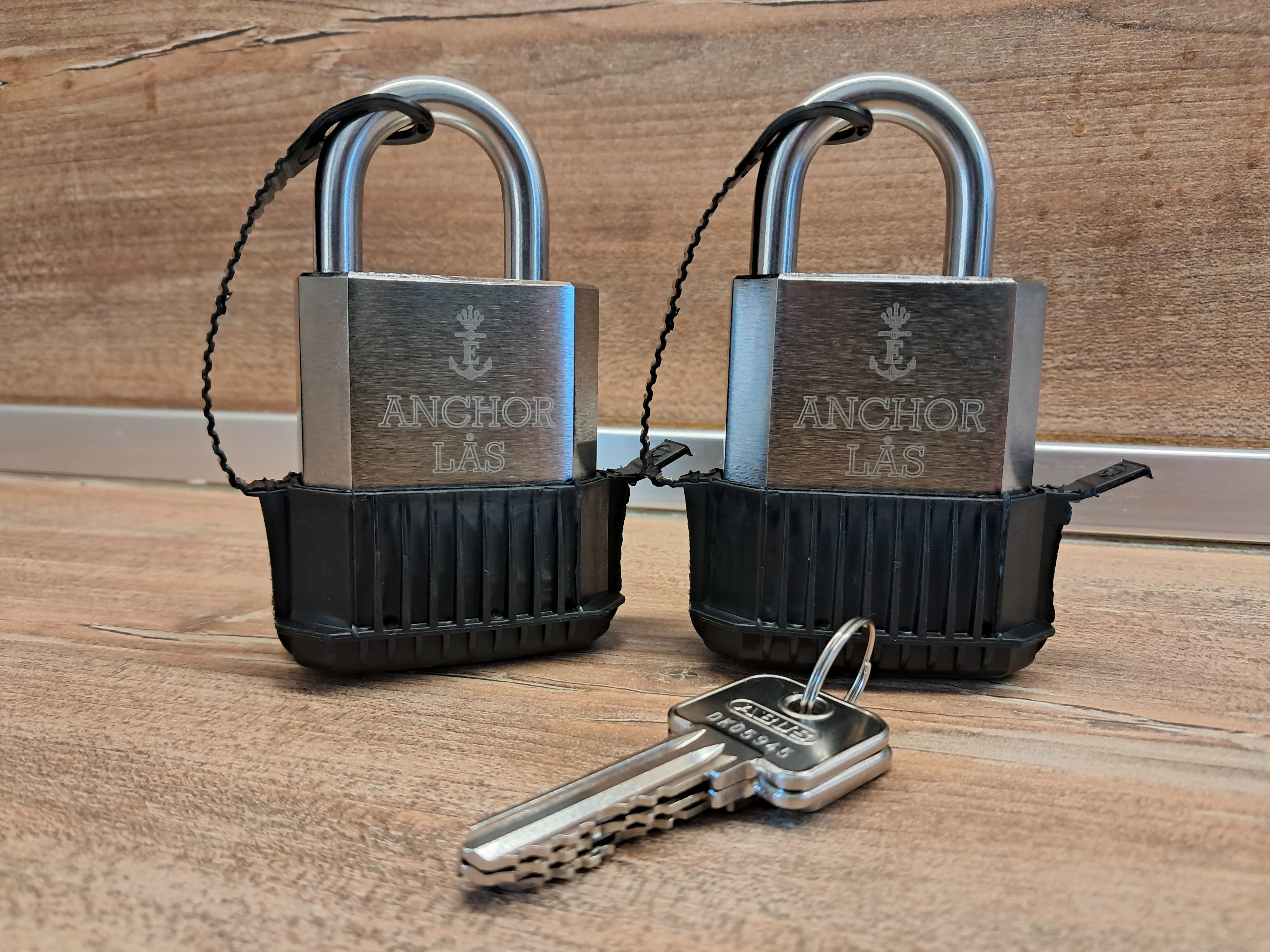 A pair of keyed-alike Anchor Las 802-2 padlocks with their key