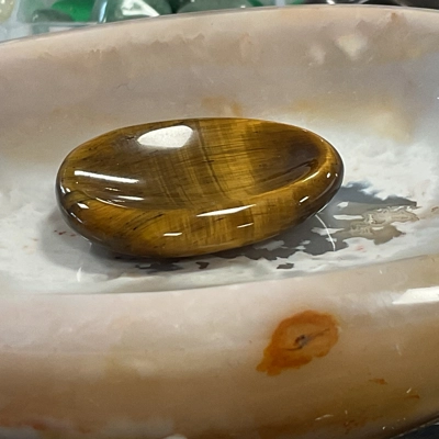Tigers eye thumb stone Tigers eye thumb stone