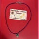 Mardi Gras Charm With Leather purple Necklace wi..