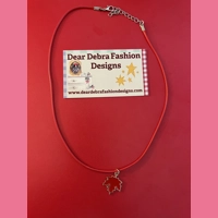 Red Leaf Charm With Leather Orang..