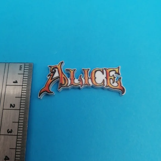 American McGee's Alice logo pin badge