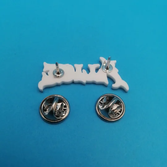 American McGee's Alice logo pin badge