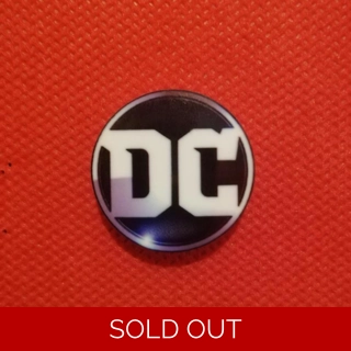 DC logo pin badge