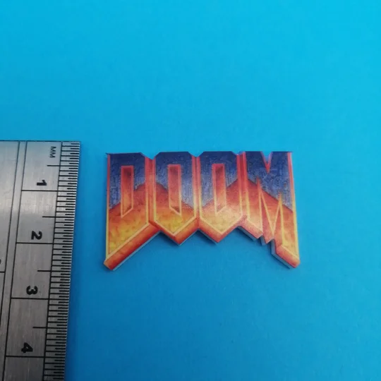 DOOM logo pin badge