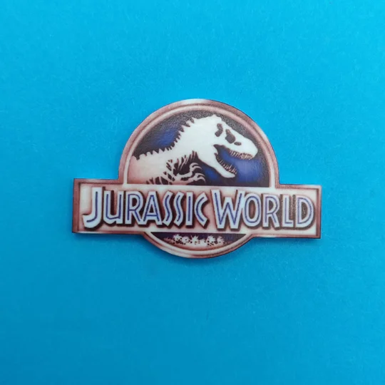 Jurassic World logo pin badge