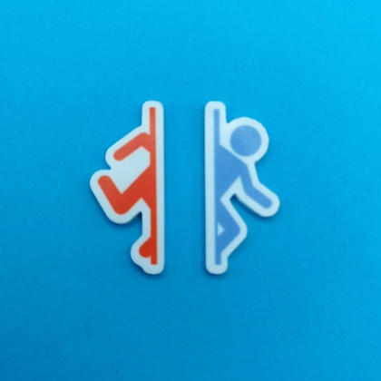 Portal - Orange and Blue pin badge set Portal - Orange and Blue pin badge set