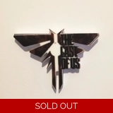 The Last of Us logo pin badge