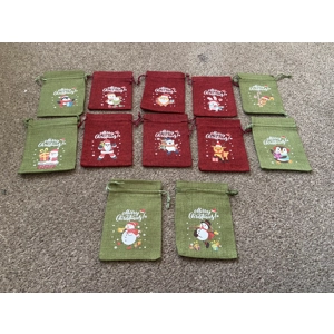 Hessian Xmas bags x 12. 5.5” x 4”.