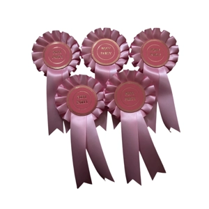 Set of 5 pony party rosettes.  Pink. 1 tier.  50mm centres.  Safety pin backs