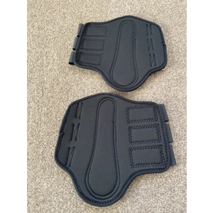 Black neoprene brushing boots.  BN. Pony size.