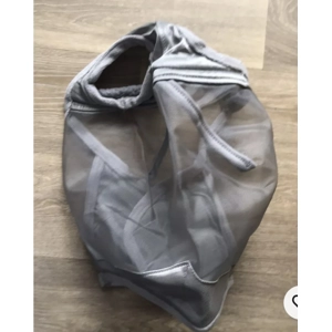 Harrison howard caremaster fly mask. No ears, no nose. Silver.