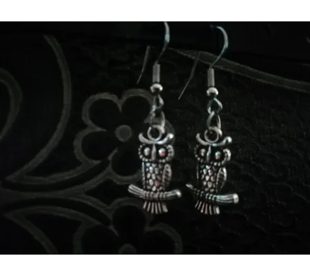 owl sat on branch pendant earrings