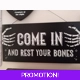 Come in and rest your bones hanging sign