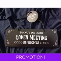 Coven meeting in progress sign