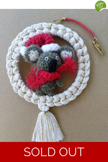 Handmade macrame wreath with handmade Koala standing in the wreath