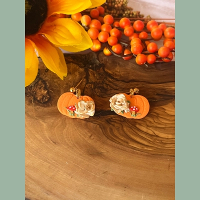 Handmade Polymer Clay Floral Pumpkin Fall Earrings. Handmade Polymer Clay Floral Pumpkin Fall Earrings.