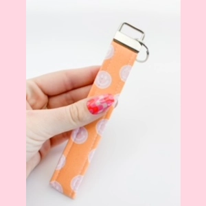 Orange Smiley Wristlet