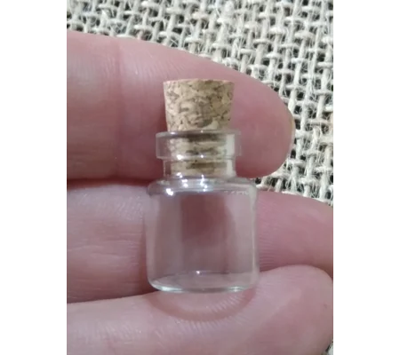 miniature glass potion bottle with cork stopper
