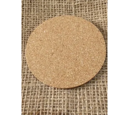small round cork base for displaying miniatures and felted works