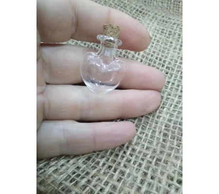 miniature heart shaped glass potion bottle with cork stopper