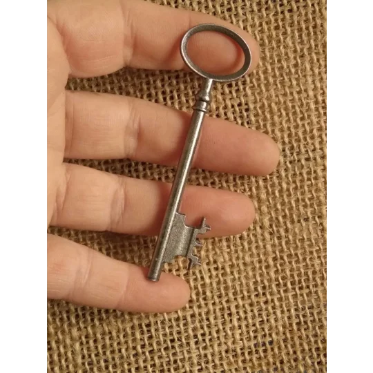 Dark silver colour metal key, prop, crafting supplies