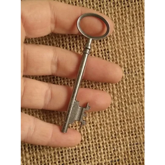 Dark silver colour metal key, prop, crafting supplies