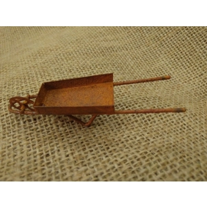 Miniature rusty metal wheelbarrow