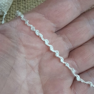 silk boucle, silk yarn, silk thread, boucle thread, wet felting, nuno felting, felting, natural silk