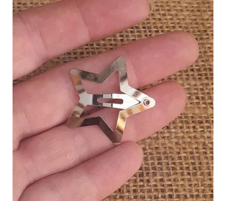 Mini Metal Doll Hair Clip in a Silver Star Design