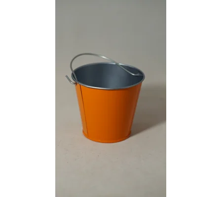 Small orange metal bucket