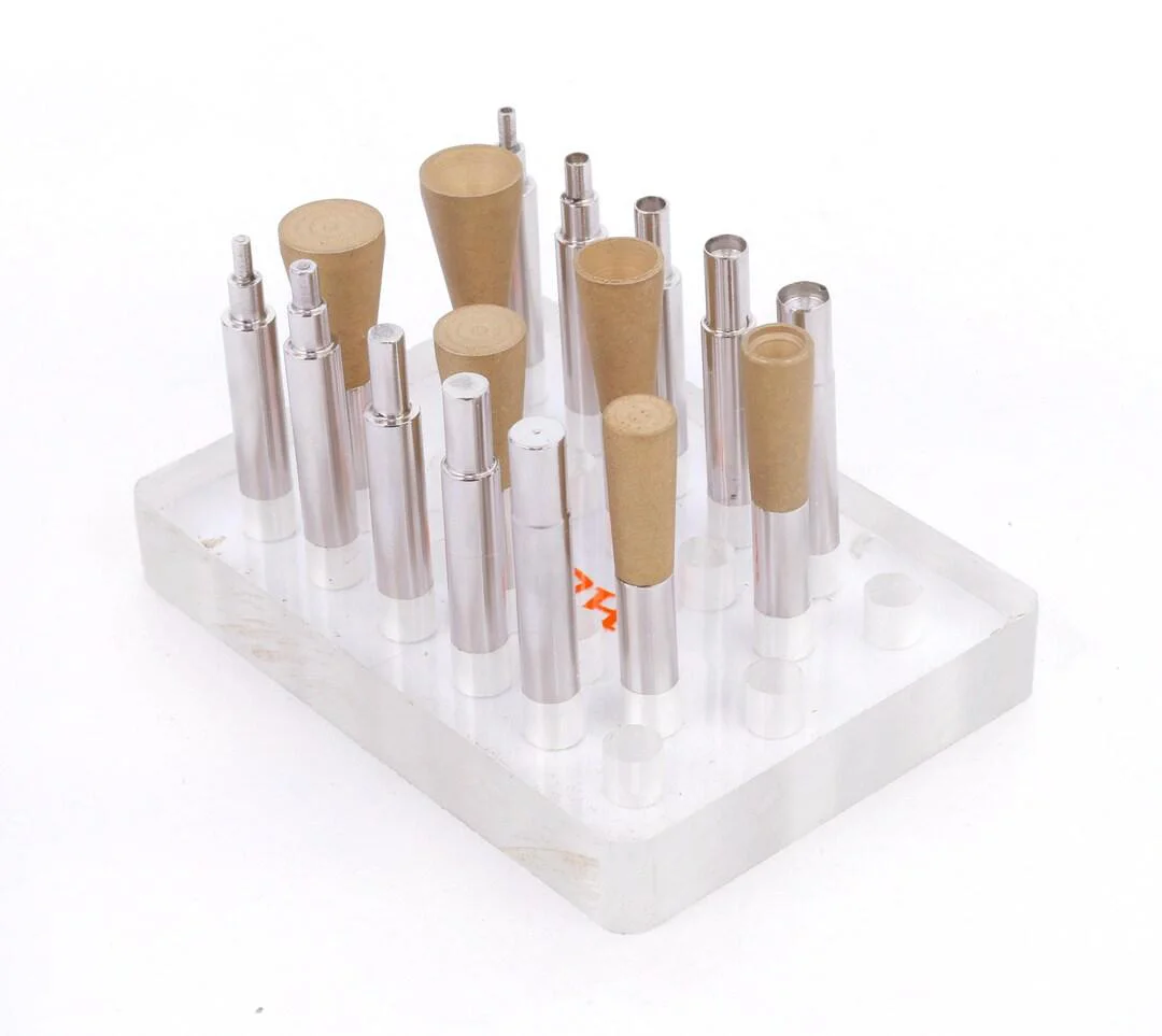 Metal dop sticks used to hold gemstones during faceting