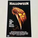 JOHN CARPENTER SIGNED HALLOWEEN 11x17 POSTER & BECKETT CERTIFIED BAS COA