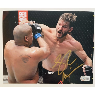UFC 8x10 SIGNED by STIPE MIOCIC and BECKETT CERTIFIED 14
