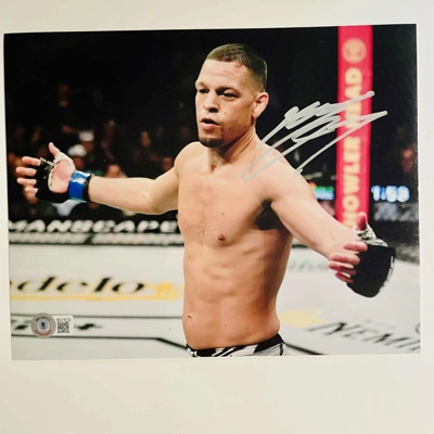 NATE DIAZ SIGNED UFC 8x10 & BECKETT CERTIFIED BAS COA NATE DIAZ SIGNED UFC 8x10 & BECKETT CERTIFIED BAS COA