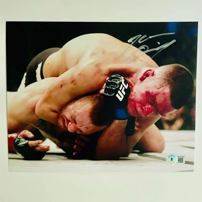 NATE DIAZ SIGNED UFC 8x10 & BECKETT CERTIFIED BAS COA NATE DIAZ SIGNED UFC 8x10 & BECKETT CERTIFIED BAS COA