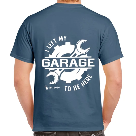 indigo blue gildan cottton tshirt with white print of text and imagery. text revolves around a spanner and gear cog saying i left my garage to be here
