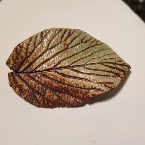 Handmade M. Hughto signed ceramic leaf brooch