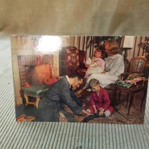 Vintage postcard family Christmas theme QUantity Postcards co.