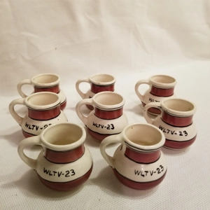 Lot of 8 mini jugs shot glasses WLTV 23