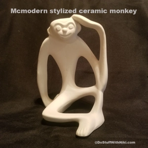 Mid cent modern stylized sitting monkey