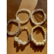 Clear white pearl style elasticated bead bracele..