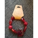 Red glass and plastic beaded bracelet