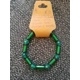 Green glass and plastic bead bracelet