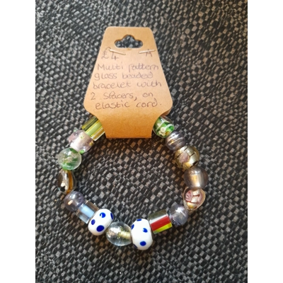 Glass bracelet with two dotted spacers Glass bracelet with two dotted spacers