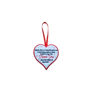 Heart-shaped decoration with a red border and red ribbon loop, embroidered with hearts, stars, and the message ‘You’ve done so many things for me… I want to say a big Thank You from the bottom of my heart’.