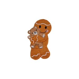A gingerbread character holding a small teddy bear in a gentle cuddle, with stitched details, rosy cheeks, and a warm smiling expression.